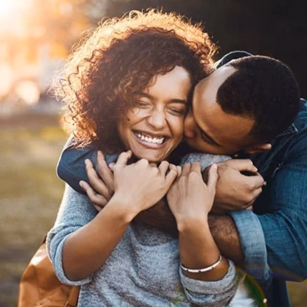 a man and woman hugging