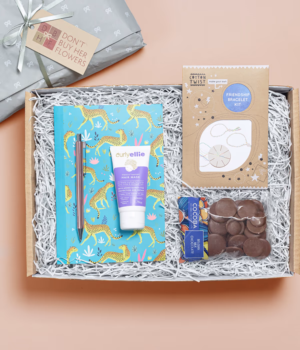 DBHF_KIDS411_COCOBABUTTONS_CHEETAHNOTEBOOK_PEN_IN.jpg
