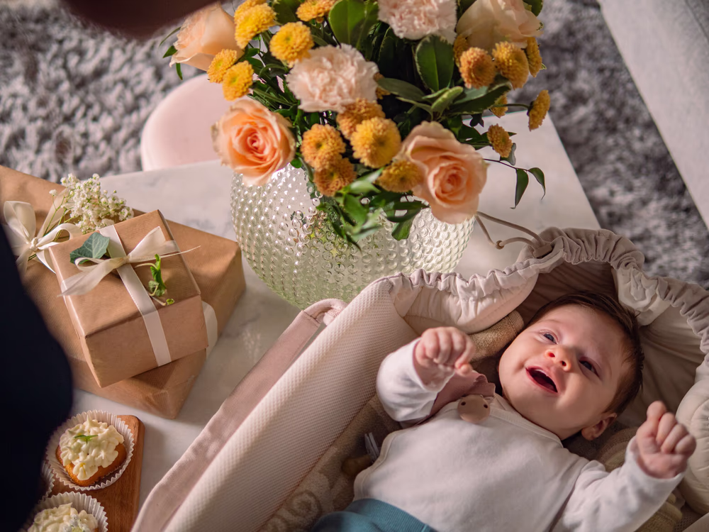 baby with parents cuddling