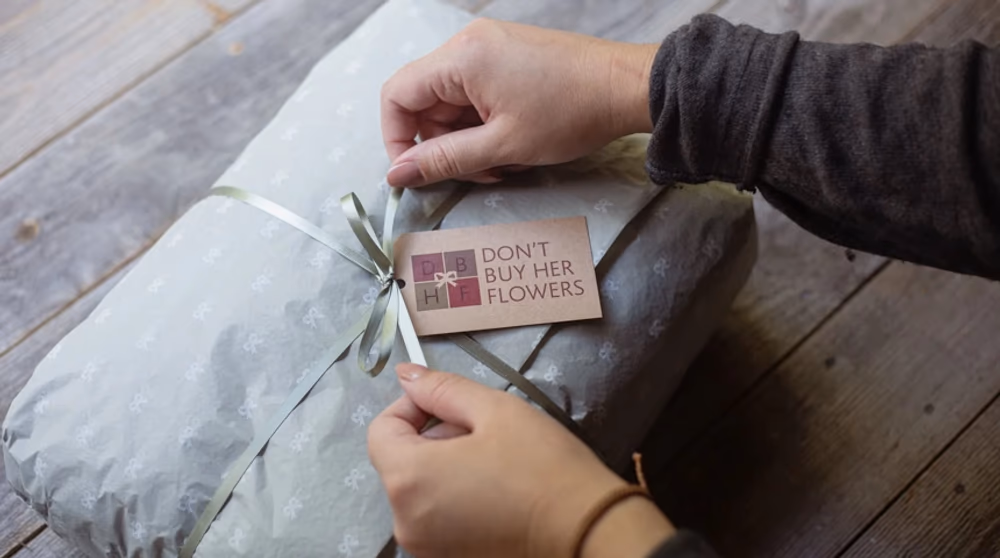 DBHF tag on wrapped gift box